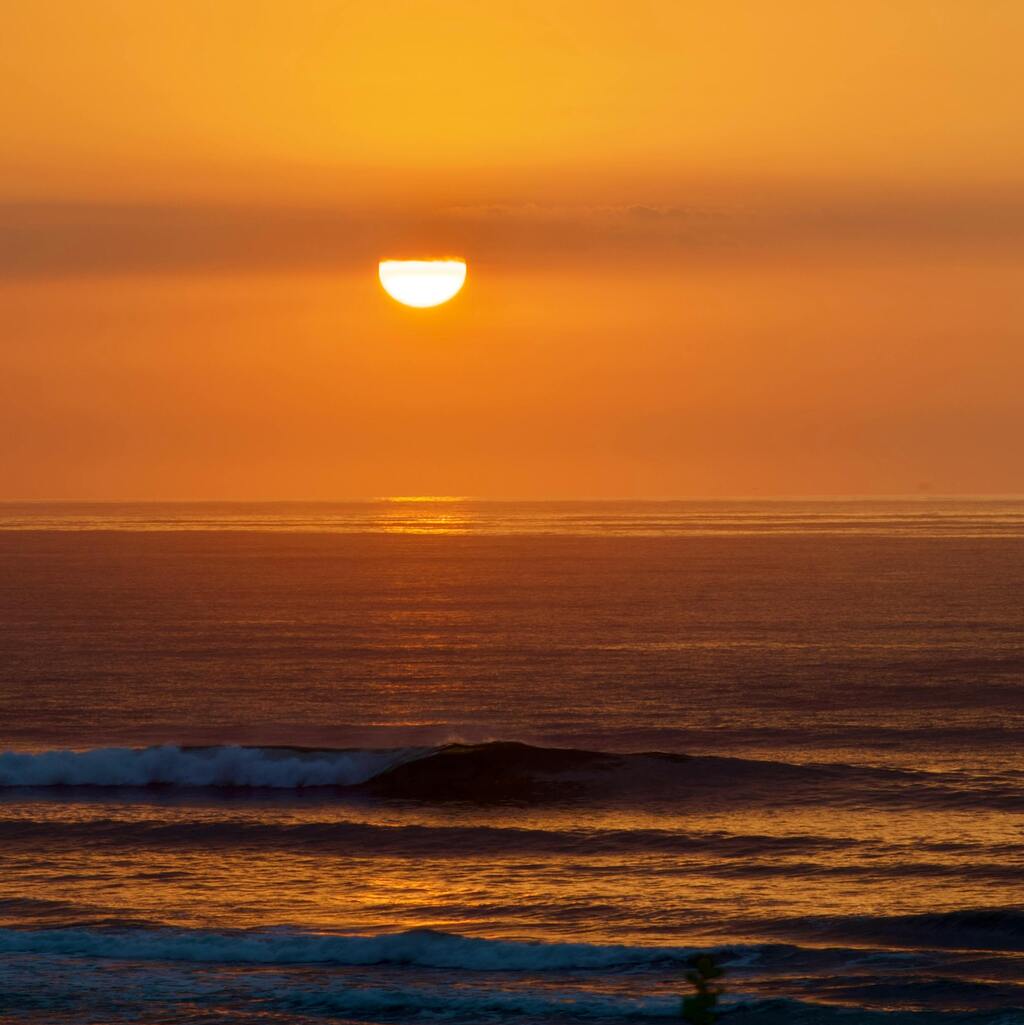 Golden sunset over the ocean in Cape Town.