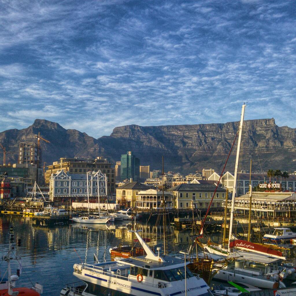 Cape Town Harbor and the iconic Table Mountain in the background.   
