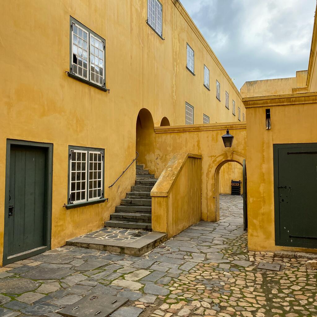 A yellow courtyard in the historical Castle of Good Hope in Cape Town.