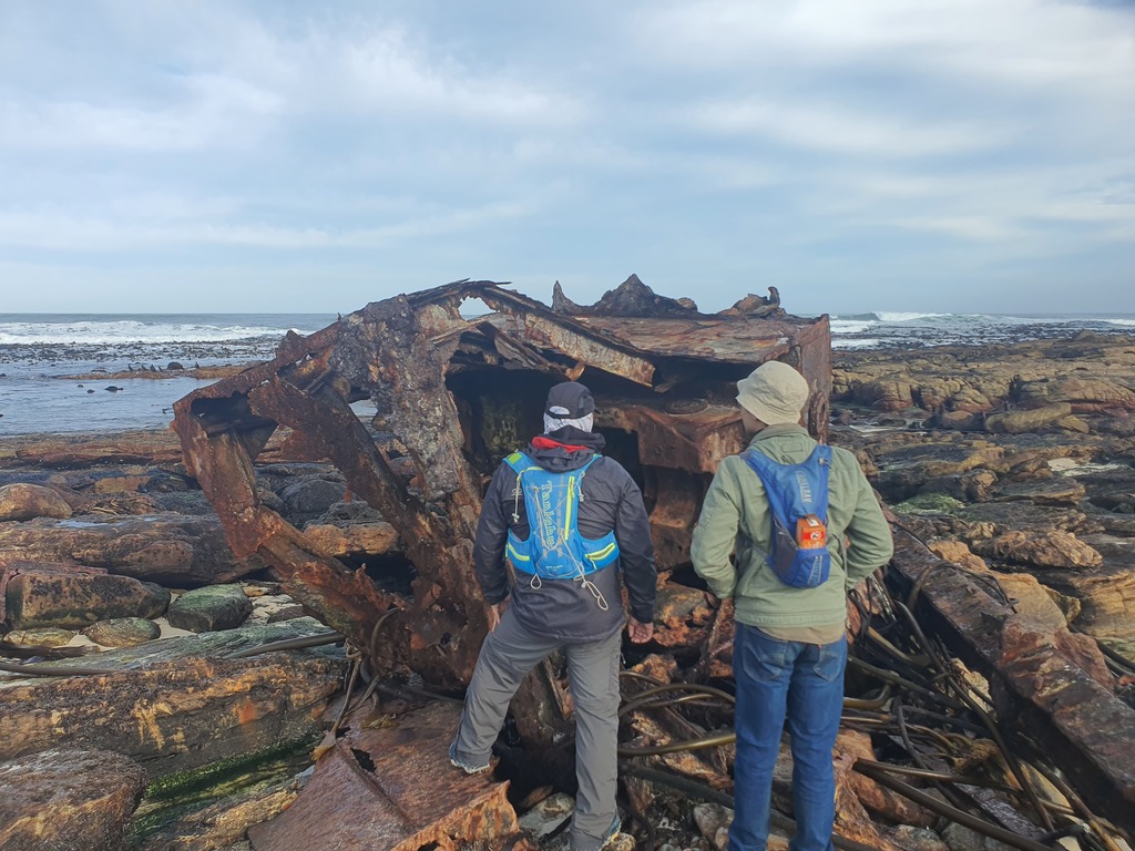 VDK guides looking at a shipwreck.